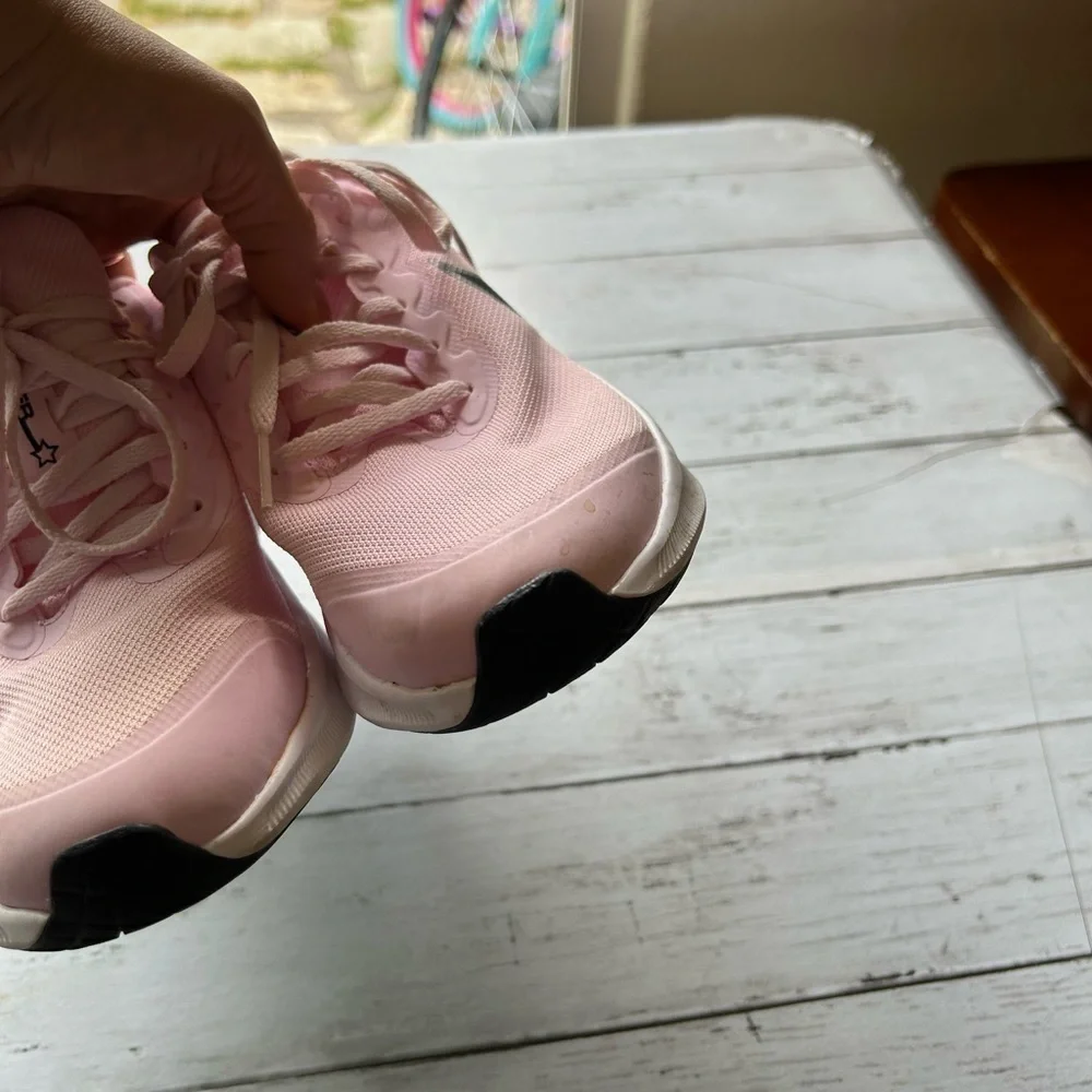 Nike Star Runne pink and black athletic shoes size 7Y